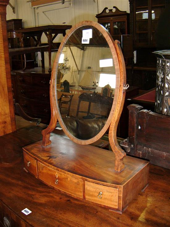 A George III bowfront toilet mirror